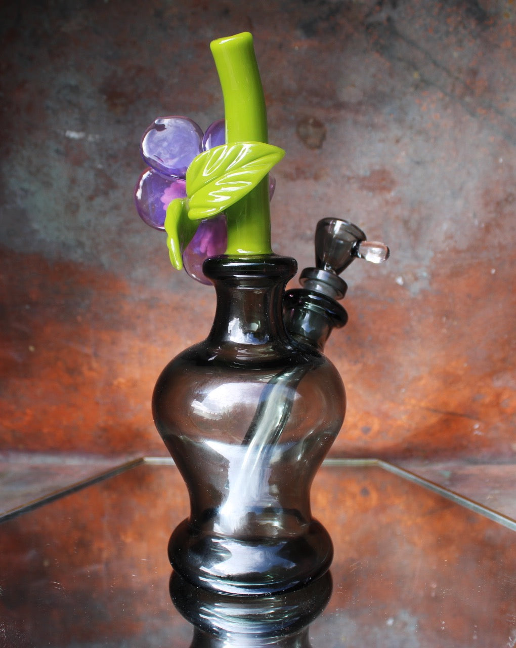 Purple pansy in a smoky grey bud vase mini-bubbler