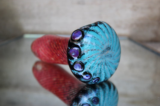 Turquoise, black and pink hand pipe